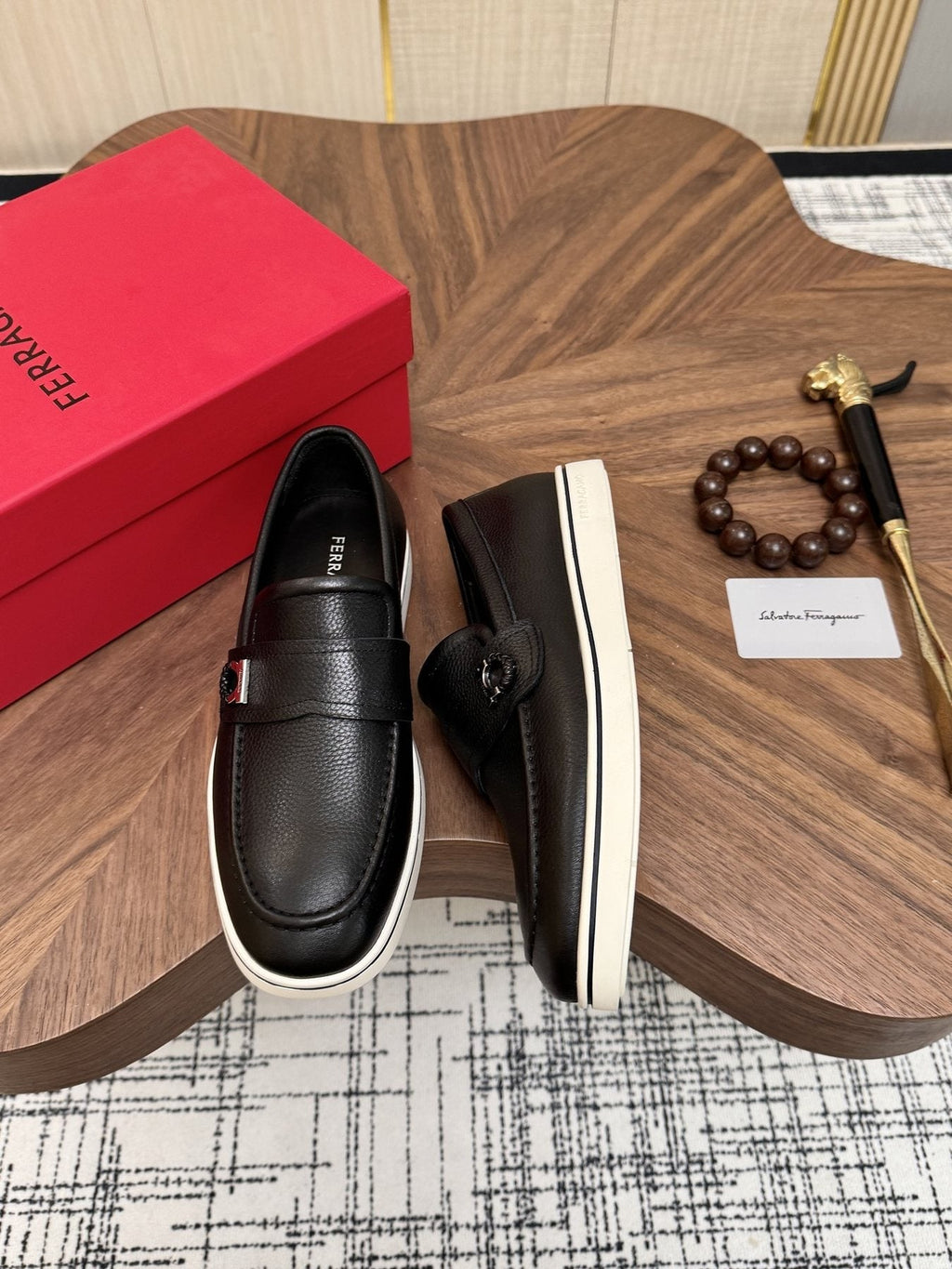 Salvatore Ferragamo Black Loafers with White Soles