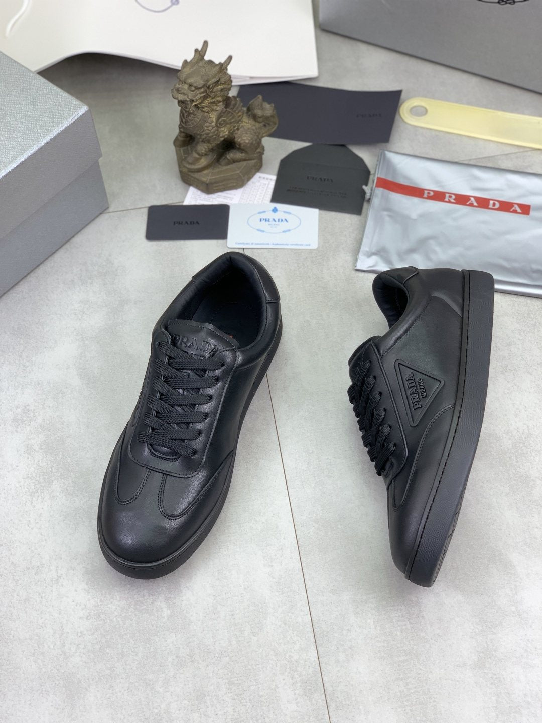 Prada Paneled Low-Top Sneakers